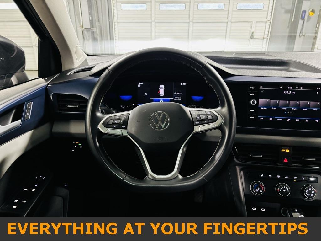 used 2022 Volkswagen Taos car, priced at $20,000