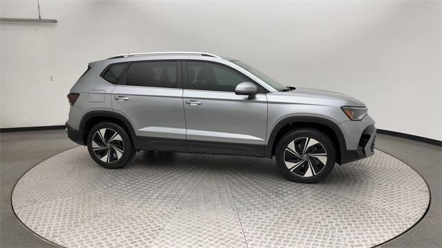 used 2025 Volkswagen Taos car, priced at $27,700
