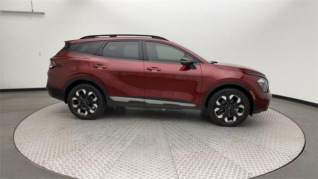 used 2023 Kia Sportage Plug-In Hybrid car, priced at $32,228