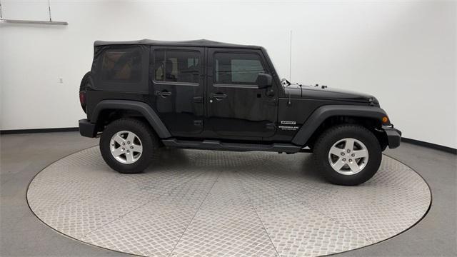 used 2014 Jeep Wrangler Unlimited car, priced at $17,270