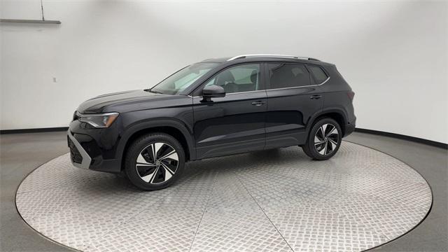 used 2025 Volkswagen Taos car, priced at $29,499
