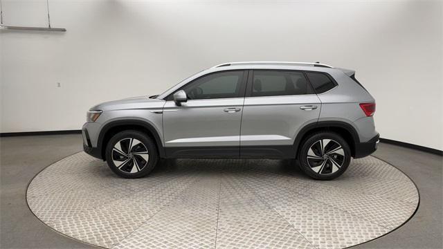 used 2024 Volkswagen Taos car, priced at $27,300