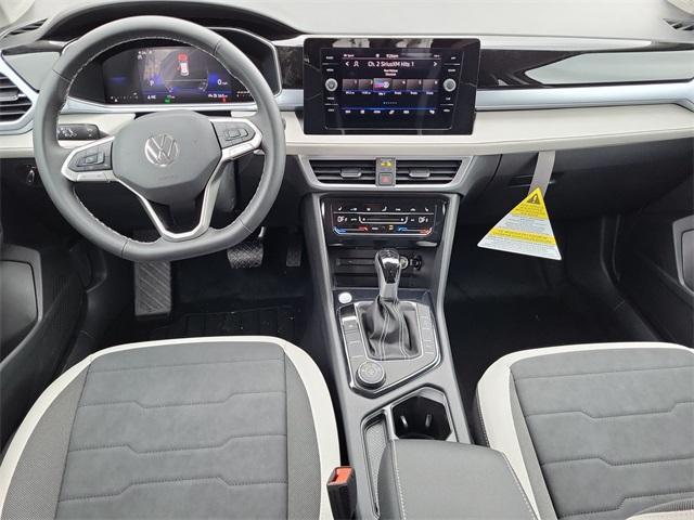 new 2025 Volkswagen Taos car, priced at $27,642