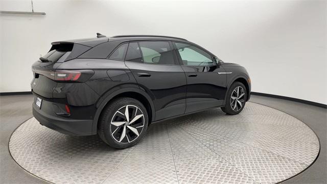 used 2023 Volkswagen ID.4 car, priced at $25,592