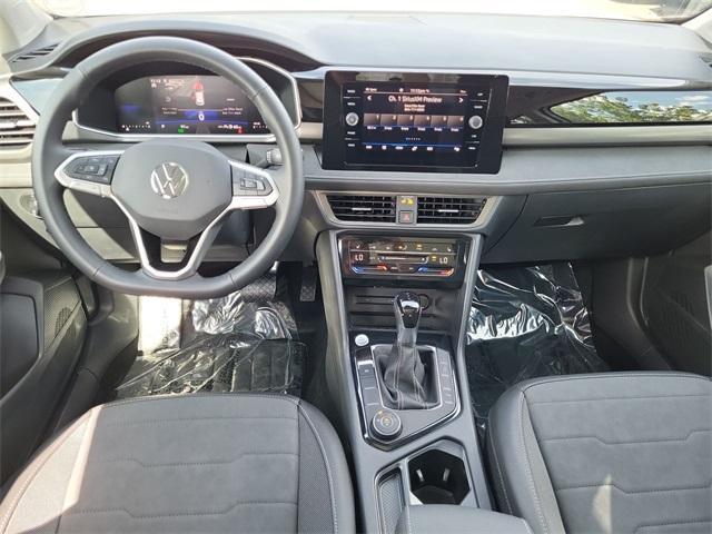 new 2025 Volkswagen Taos car, priced at $33,116