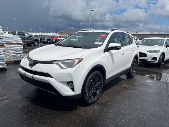 used 2018 Toyota RAV4 car, priced at $18,165