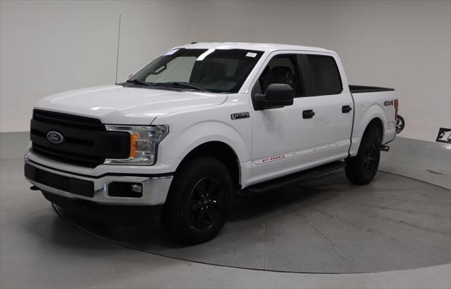 used 2018 Ford F-150 car, priced at $26,171