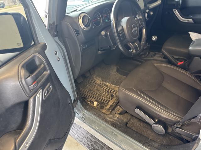 used 2015 Jeep Wrangler Unlimited car, priced at $17,288