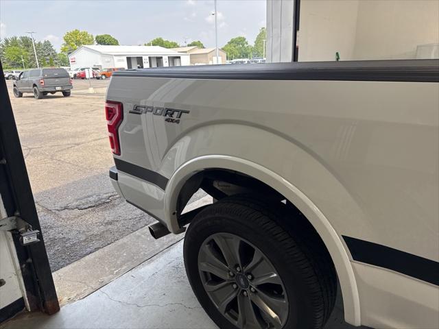 used 2018 Ford F-150 car, priced at $23,136
