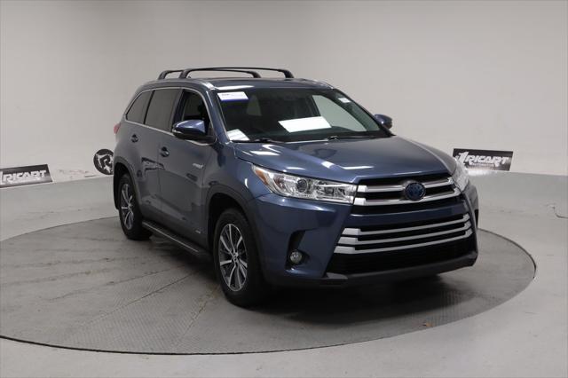 used 2019 Toyota Highlander Hybrid car, priced at $29,482