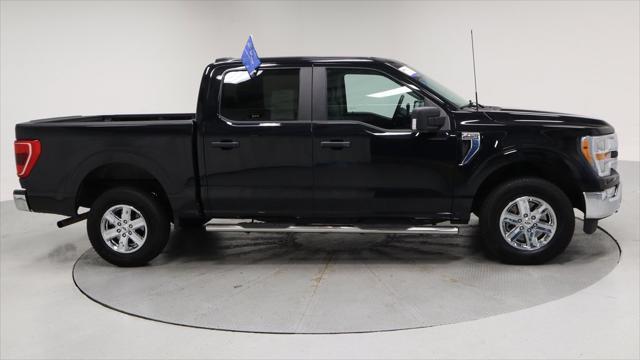 used 2021 Ford F-150 car, priced at $33,103