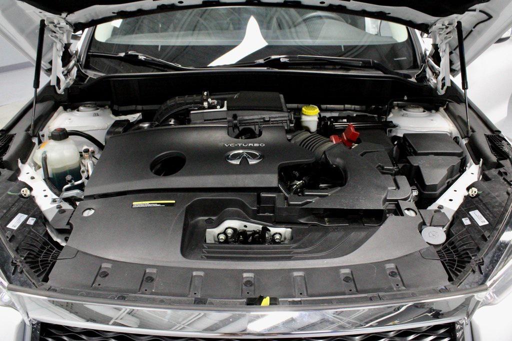 used 2024 INFINITI QX50 car, priced at $28,550