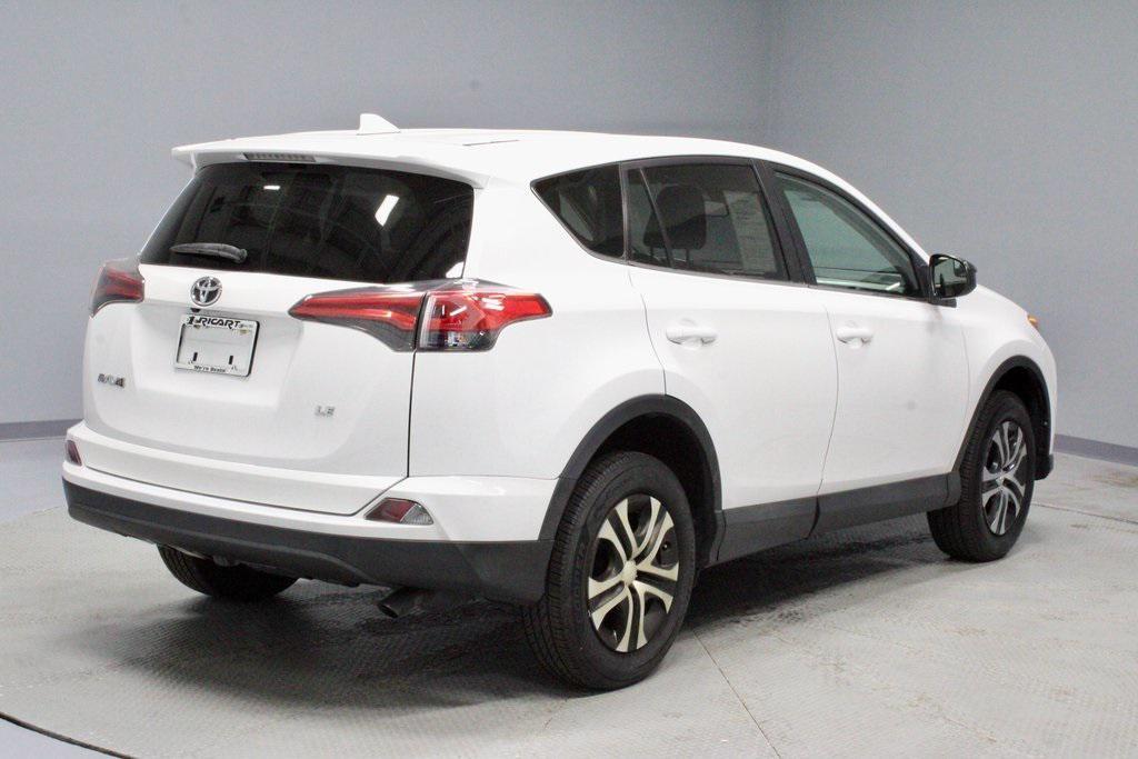used 2018 Toyota RAV4 car, priced at $19,047