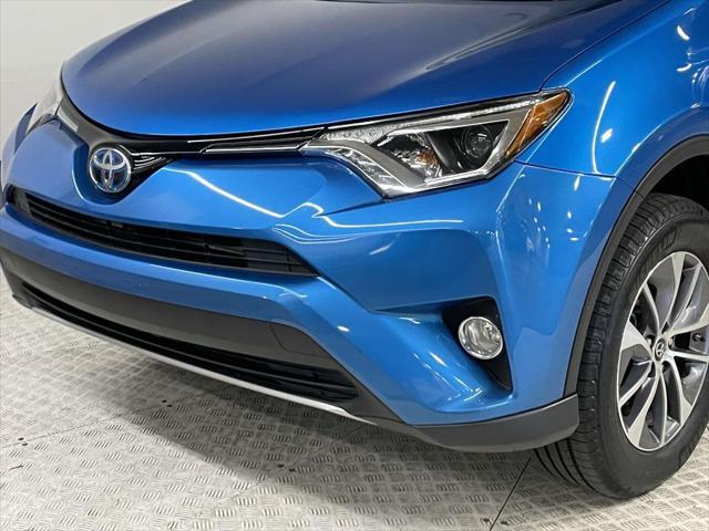 used 2018 Toyota RAV4 Hybrid car, priced at $22,996