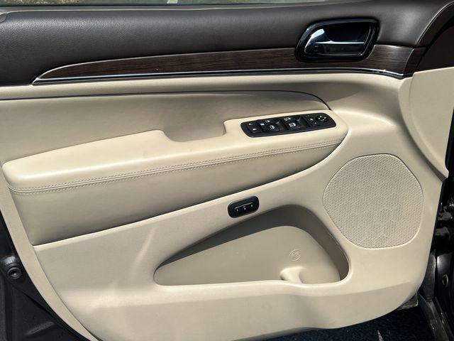 used 2021 Jeep Grand Cherokee car, priced at $29,872