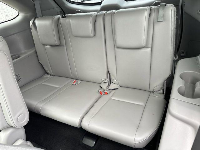 used 2019 Toyota Highlander Hybrid car, priced at $29,987