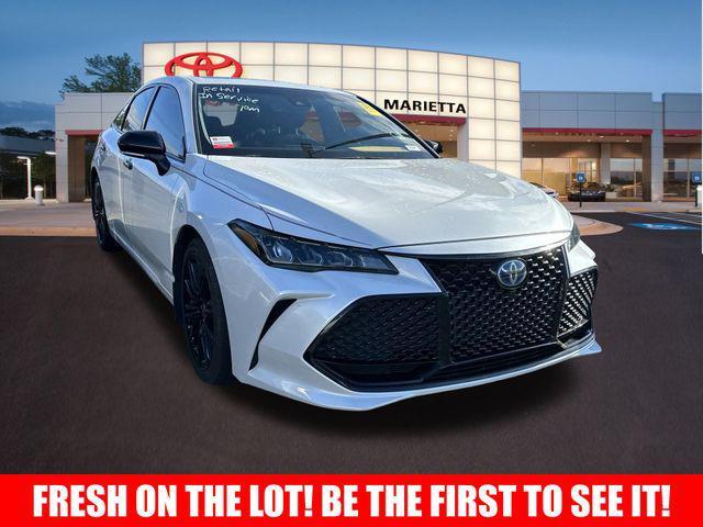 used 2022 Toyota Avalon Hybrid car, priced at $36,989