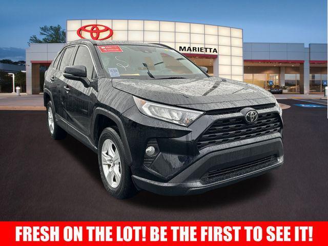 used 2021 Toyota RAV4 car, priced at $28,874