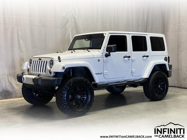 used 2012 Jeep Wrangler Unlimited car, priced at $21,610
