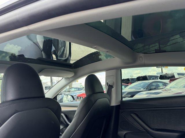 used 2023 Tesla Model 3 car, priced at $38,444