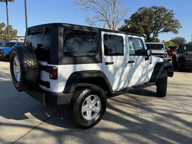 used 2015 Jeep Wrangler Unlimited car, priced at $18,605