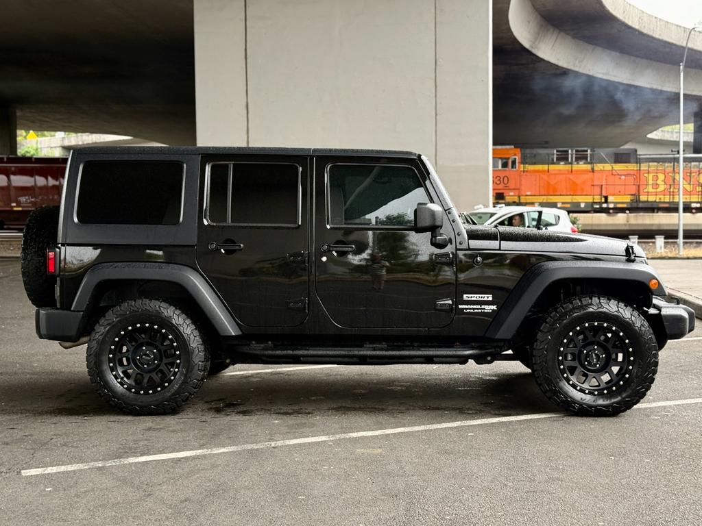 used 2018 Jeep Wrangler JK car, priced at $21,935