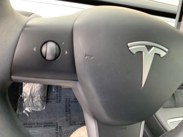 used 2023 Tesla Model 3 car, priced at $26,900
