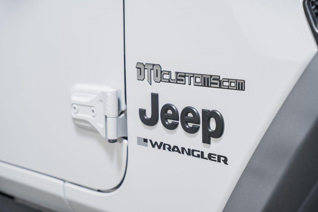 used 2024 Jeep Wrangler car, priced at $49,999