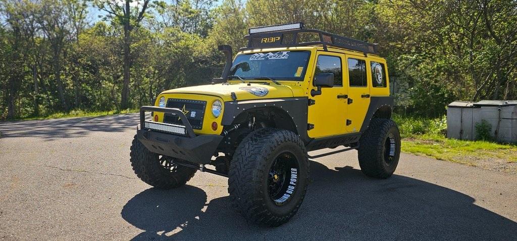 used 2013 Jeep Wrangler Unlimited car, priced at $29,990