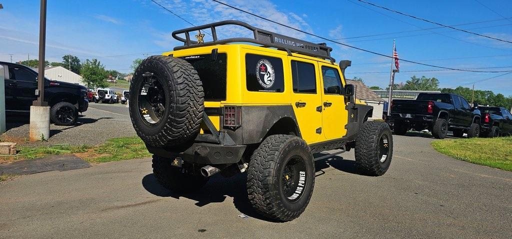 used 2013 Jeep Wrangler Unlimited car, priced at $29,990