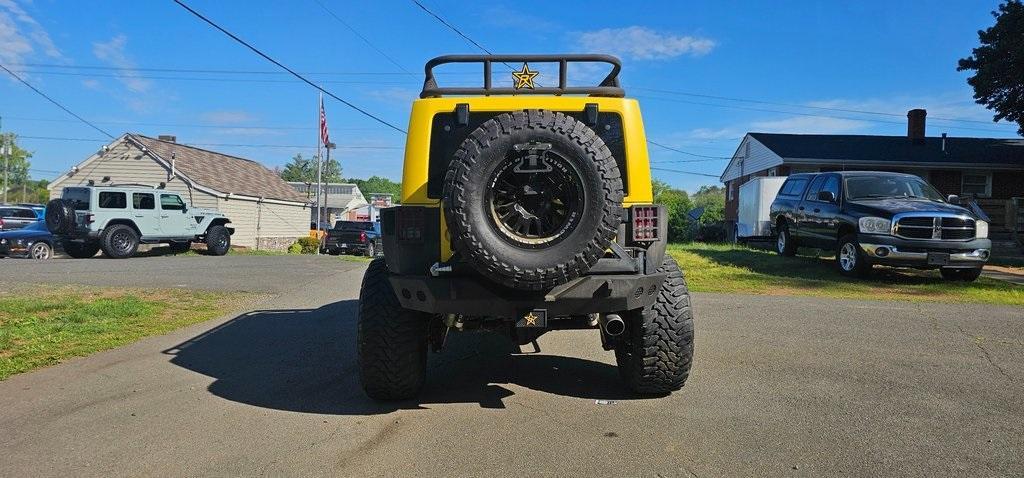 used 2013 Jeep Wrangler Unlimited car, priced at $29,990