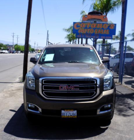 used 2015 GMC Yukon car, priced at $23,599