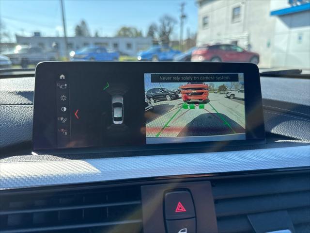 used 2018 BMW 330 car, priced at $15,999
