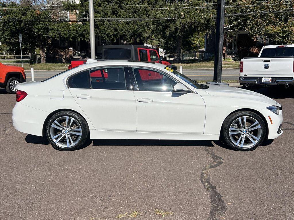 used 2018 BMW 330 car, priced at $19,245