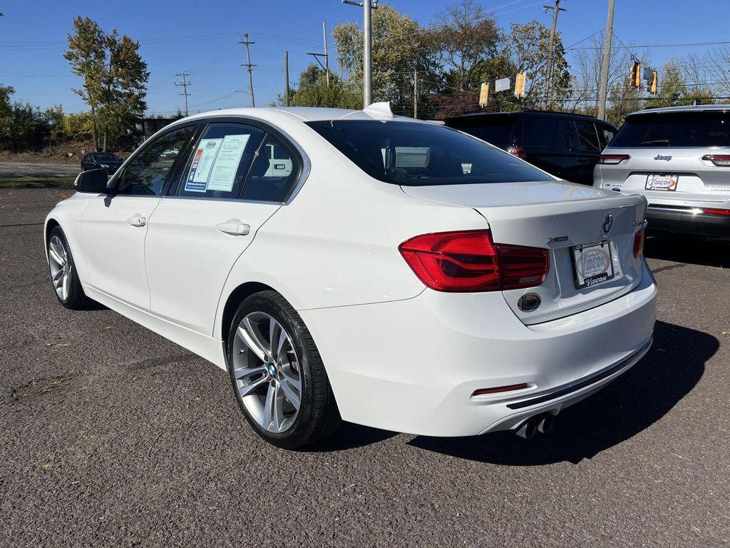 used 2018 BMW 330 car, priced at $19,245