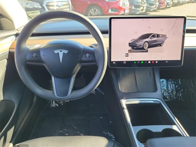 used 2023 Tesla Model 3 car, priced at $24,701