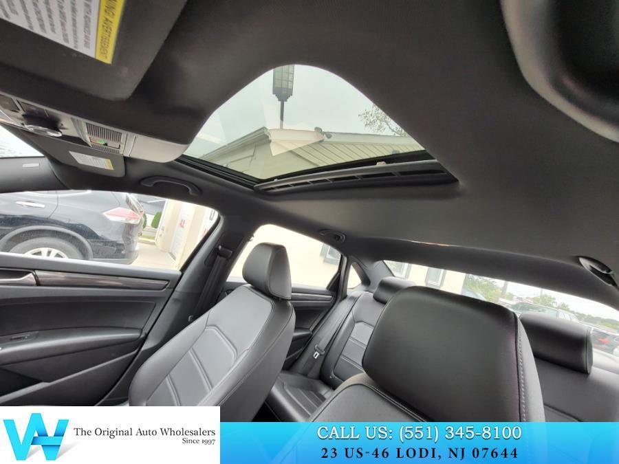 used 2021 Volkswagen Passat car, priced at $14,907