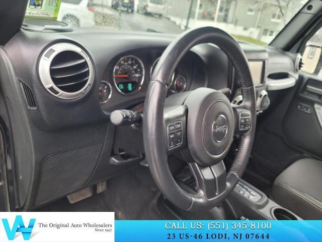 used 2015 Jeep Wrangler Unlimited car, priced at $14,734