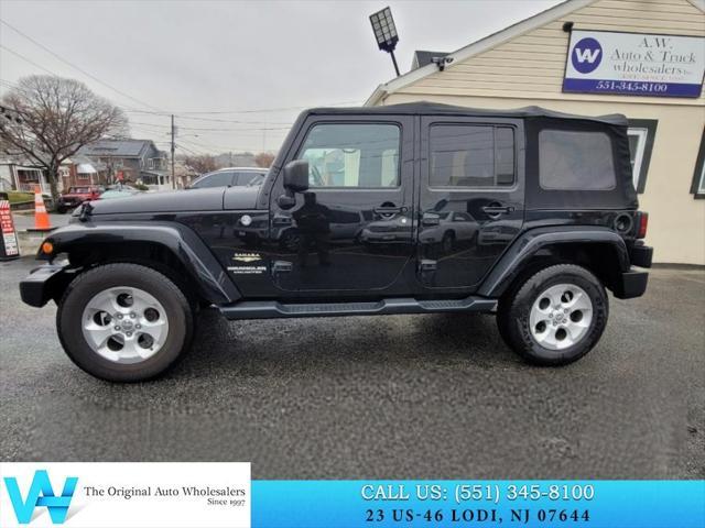 used 2015 Jeep Wrangler Unlimited car, priced at $14,734