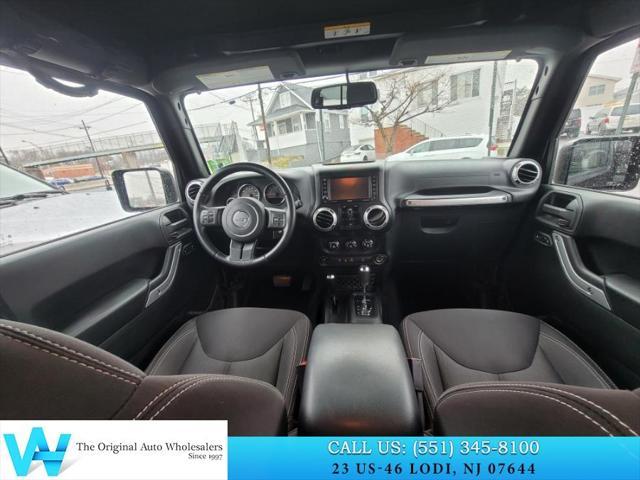 used 2015 Jeep Wrangler Unlimited car, priced at $14,734
