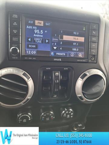 used 2015 Jeep Wrangler Unlimited car, priced at $14,734