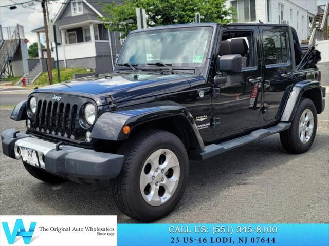 used 2015 Jeep Wrangler Unlimited car, priced at $14,534
