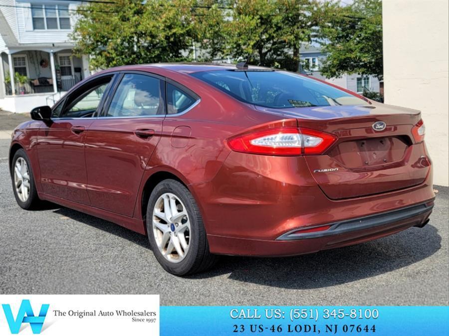 used 2014 Ford Fusion car, priced at $5,997