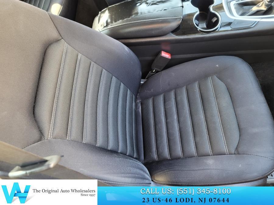 used 2014 Ford Fusion car, priced at $5,997