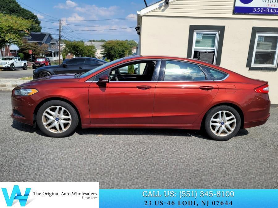 used 2014 Ford Fusion car, priced at $5,997