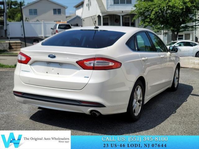 used 2013 Ford Fusion car, priced at $7,484
