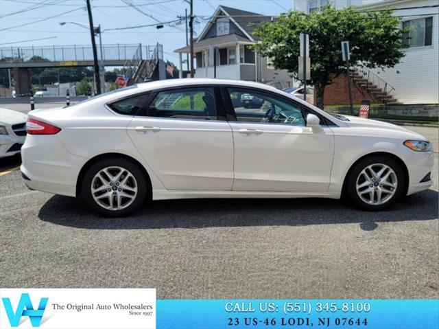 used 2013 Ford Fusion car, priced at $7,484