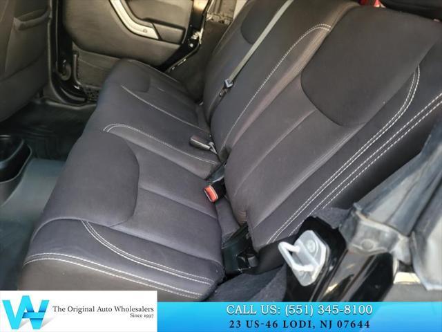 used 2014 Jeep Wrangler Unlimited car, priced at $9,997