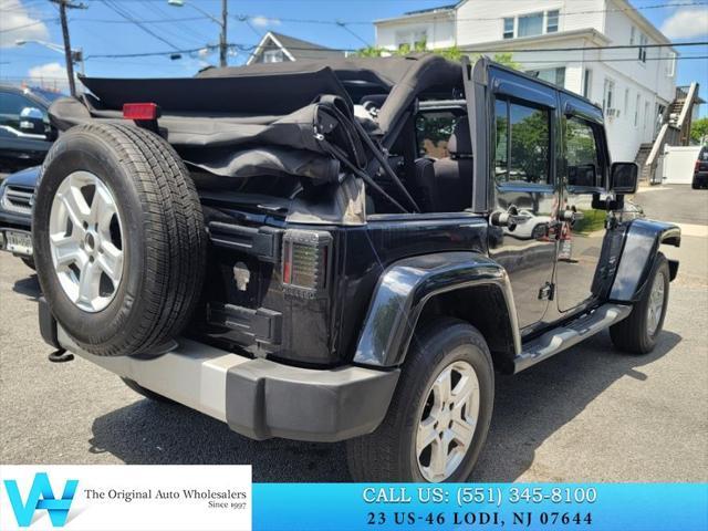 used 2014 Jeep Wrangler Unlimited car, priced at $9,997
