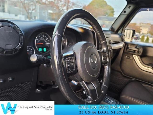 used 2014 Jeep Wrangler Unlimited car, priced at $9,997